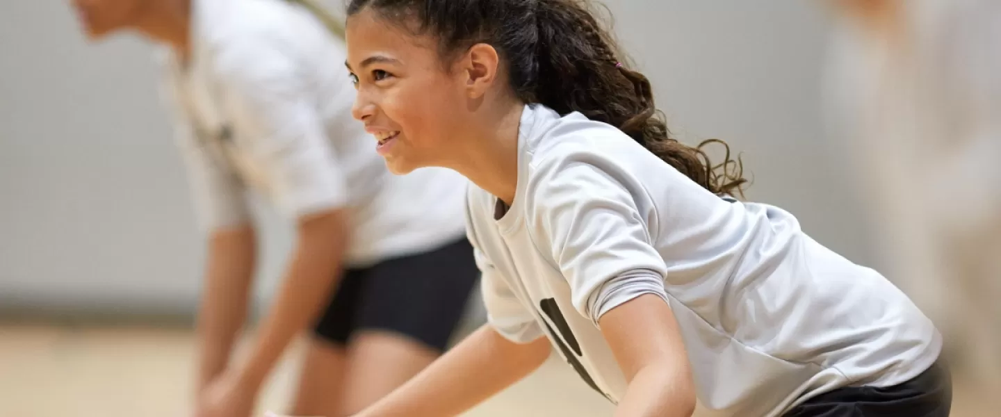 Girl playing volleyball.